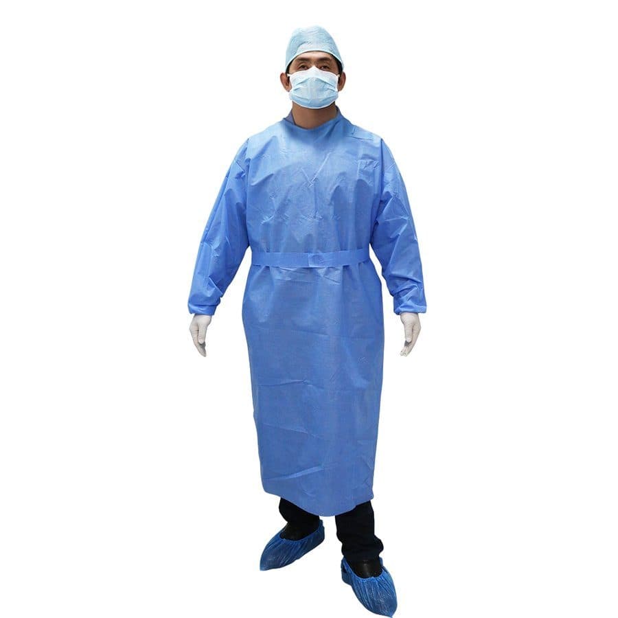 Isolation gown, cap, mask and shoe covers worn by a model