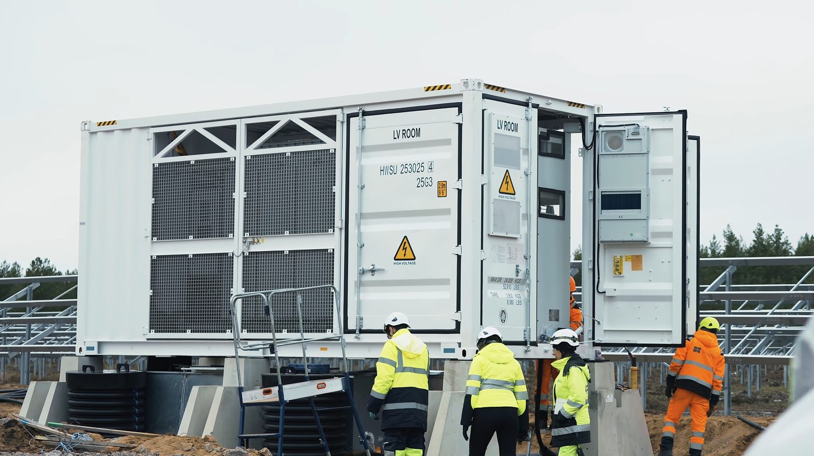 Solar panel electrical installation by certified workers on industrial rooftop
